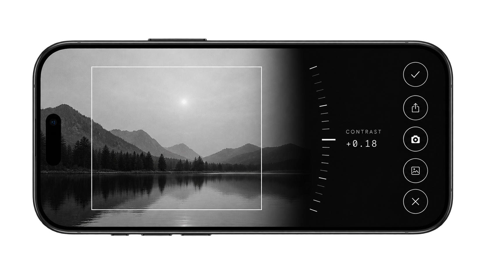 A BW editing screen with a landscape and manual dial.